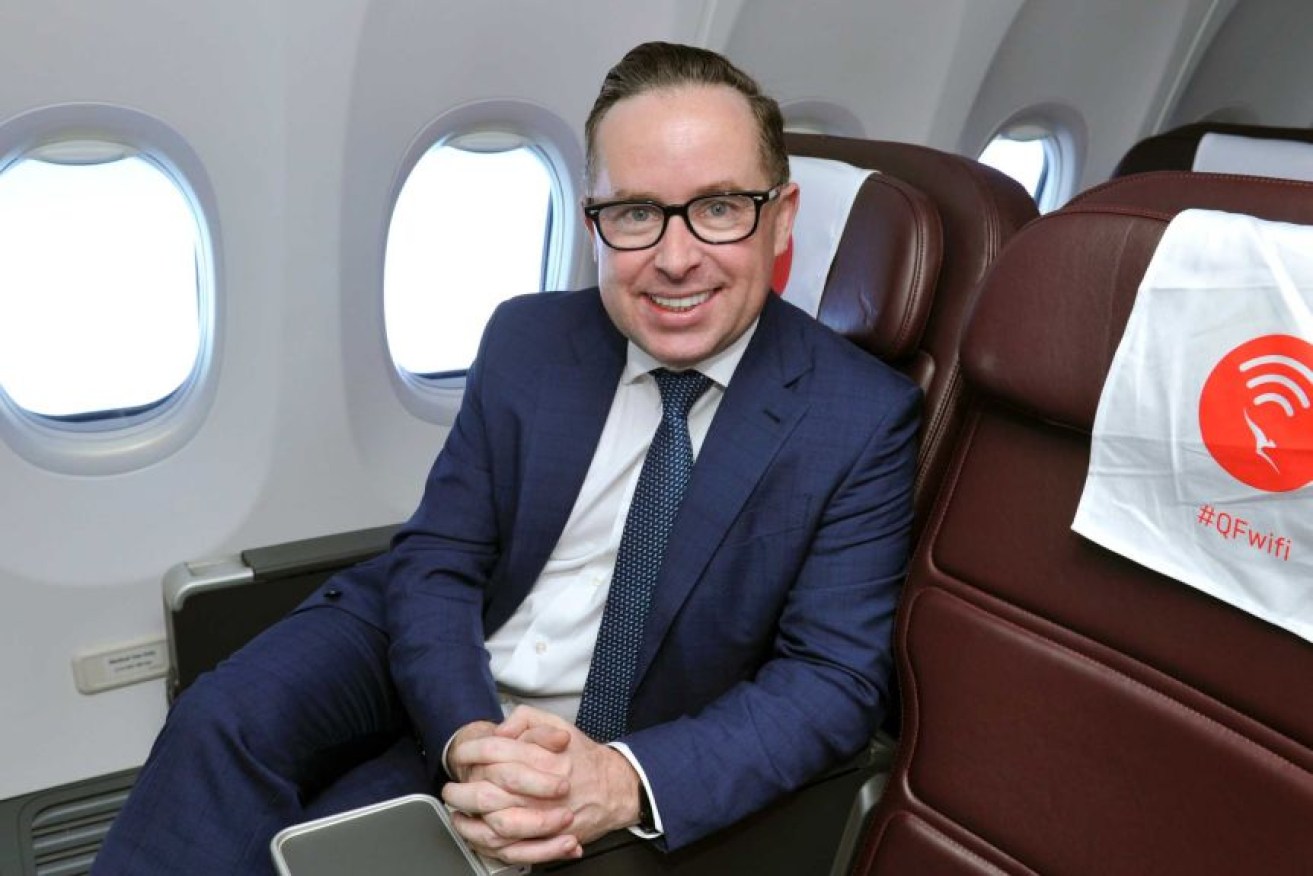 Alan Joyce says it's safe to fly on Qantas aircraft, even with no social distancing. (Photo: AAP: Joel Carrett)