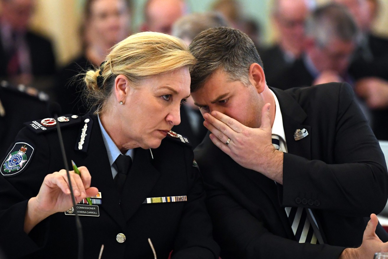 Queensland Police Minister Mark Ryan (right) and Commissioner Katarina Carroll. (Photo: AAP Image/Dan Peled) 