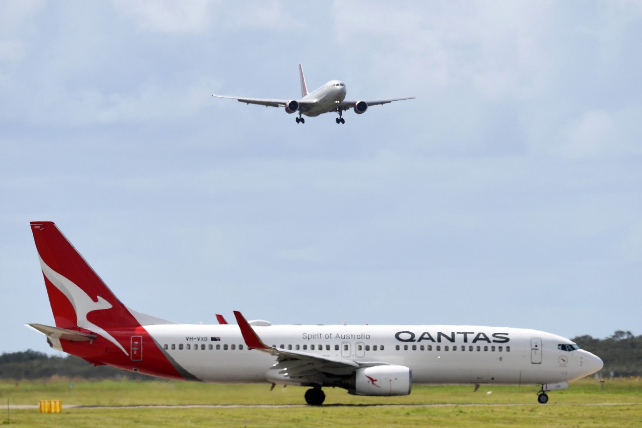 Brisbane Airport's new runway opened in mid-July. Its impact on the community is now set to be reviewed. (AAP Image/Dan Peled)