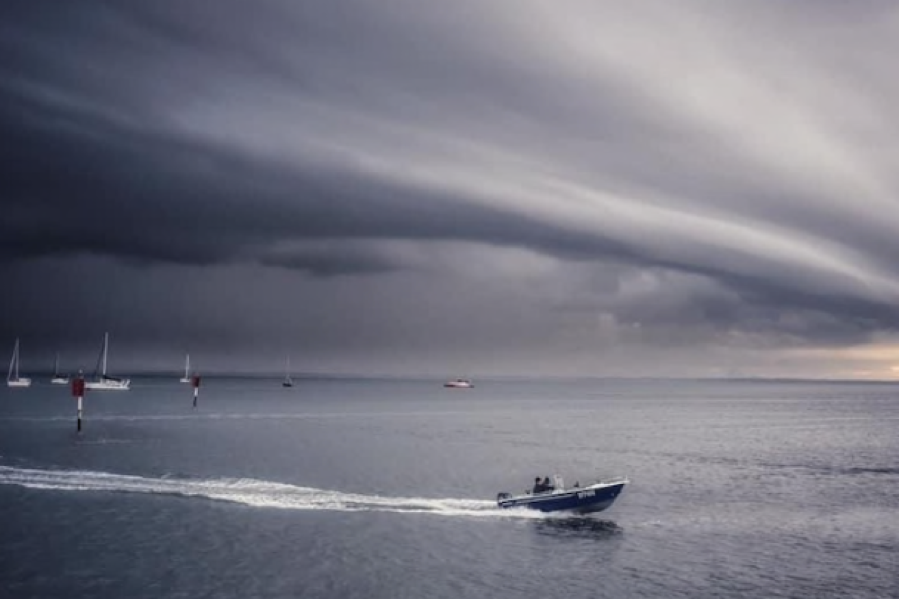 The storm is seen over Moreton Bay (ABC image).