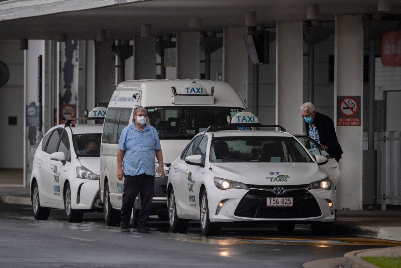 Cairns and Yarrabah remain in lockdown after a marine pilot infected a taxi driver. (AAP Image/Brian Cassey)