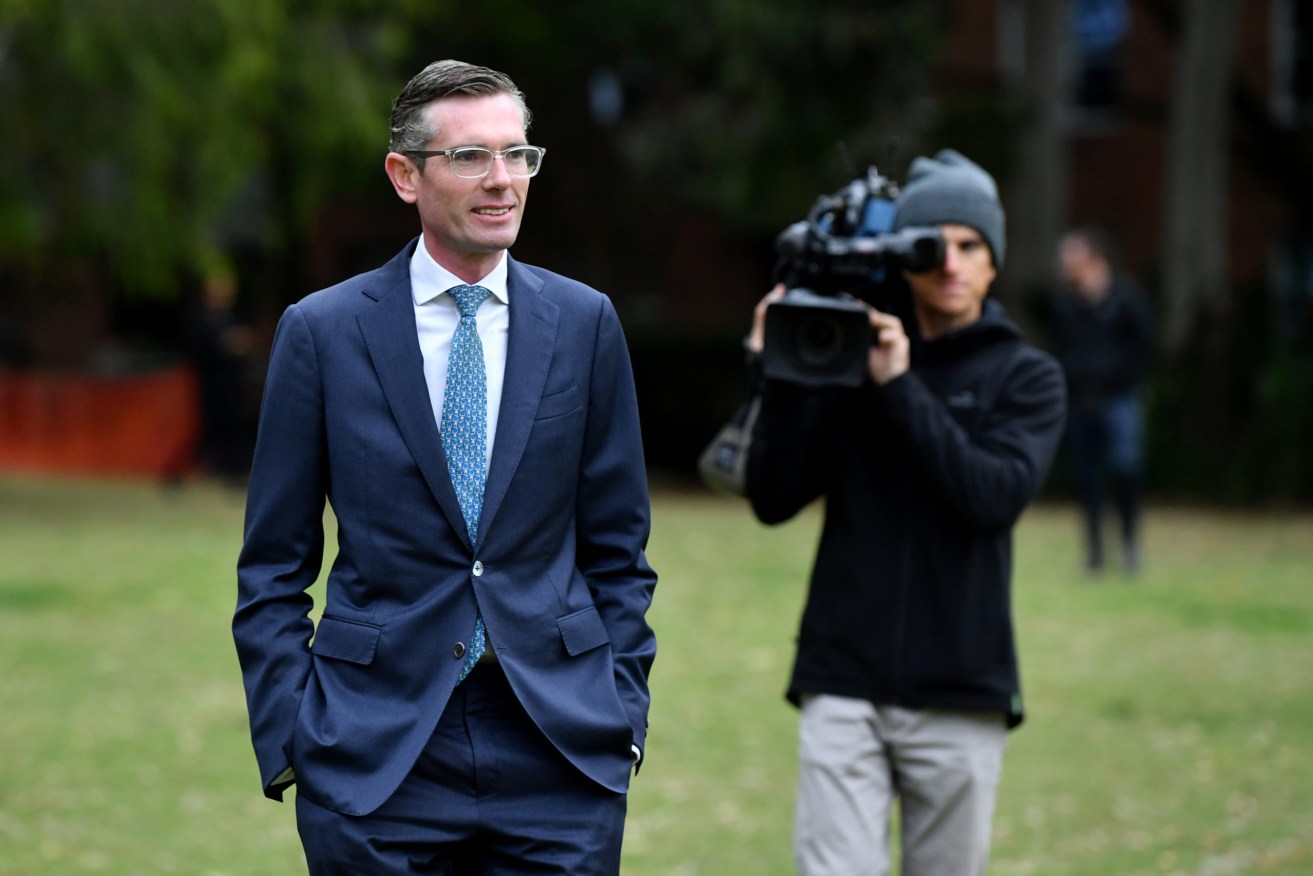 NSW Premier Dominic Perrottet leaves a press conference in Sydney, Tuesday, October 12. (AAP Image/Joel Carrett) 
