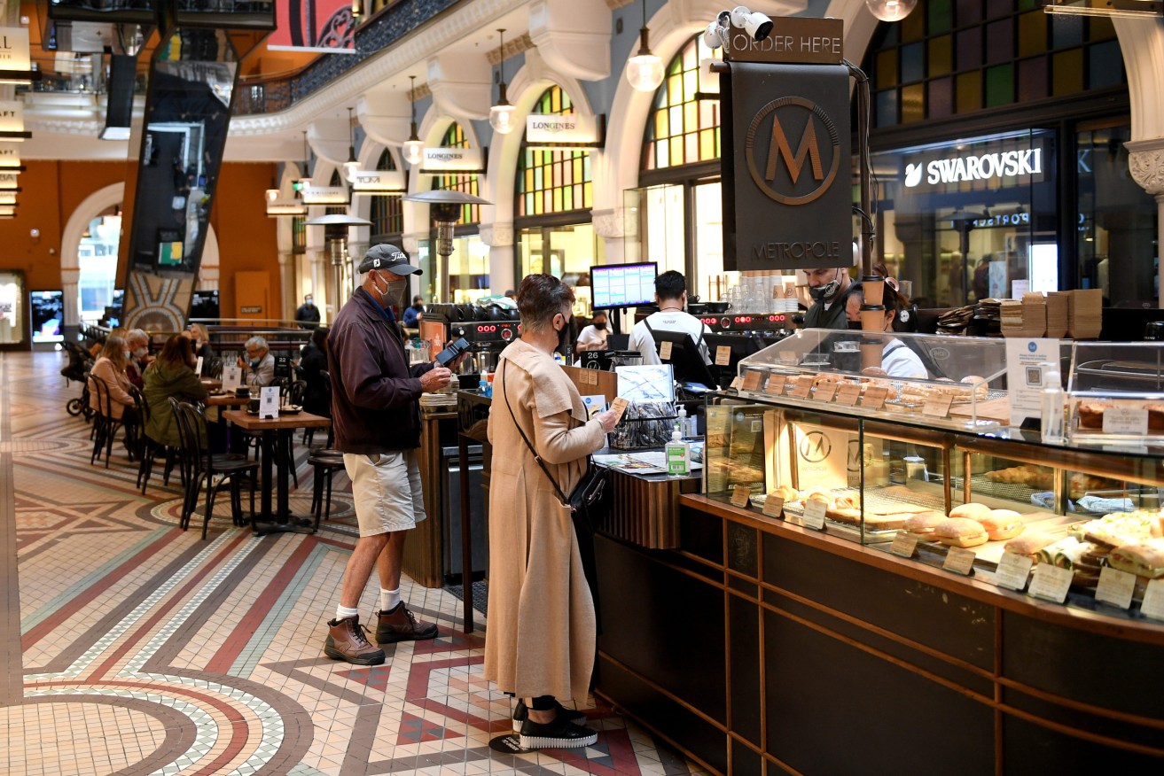 A general view of a cafe in the QVB, in Sydney, Tuesday, October 12, 2021. Having surpassed the 70 per cent double-dose vaccination milestone early, gyms, cafes, restaurants, pools, shops, hairdressers and beauticians will reopen in NSW from Monday. (AAP Image/Dan Himbrechts) NO ARCHIVING