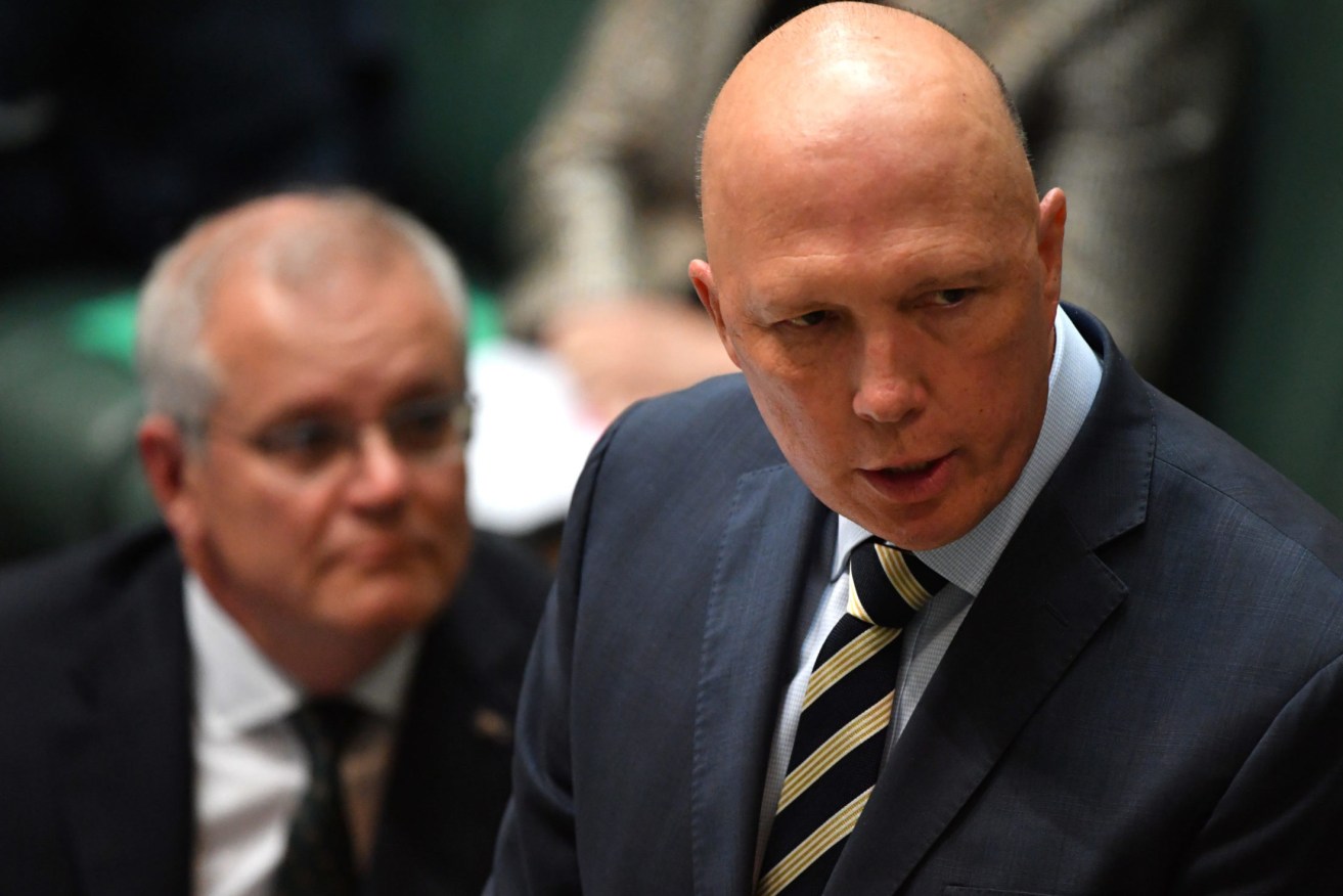 Former Minister for Defence Peter Dutton says he was not advised that the Prime Minister was assuming the powers of cabinet members.  (AAP Image/Mick Tsikas) 