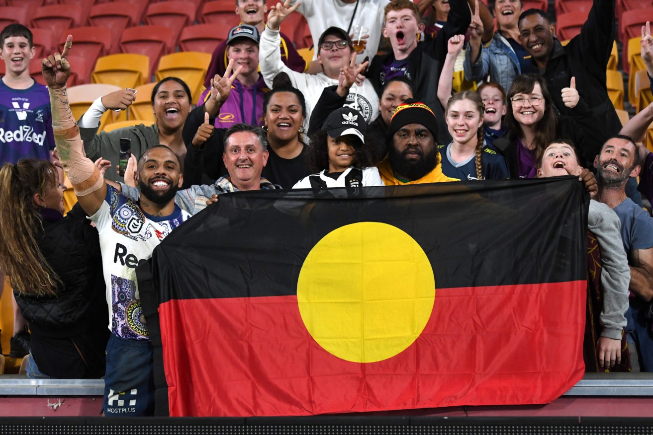 The Aboriginal flag has been freed for use by all members of the public after an epic campaign. (AAP Image/Darren England) 