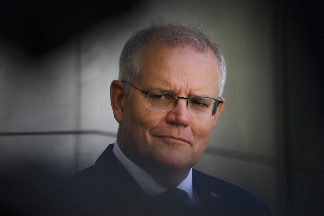 Australian Prime Minister Scott Morrison speaks during a press conference at Parliament House in Canberra, Monday, January 10, 2022. (AAP Image/Lukas Coch) 