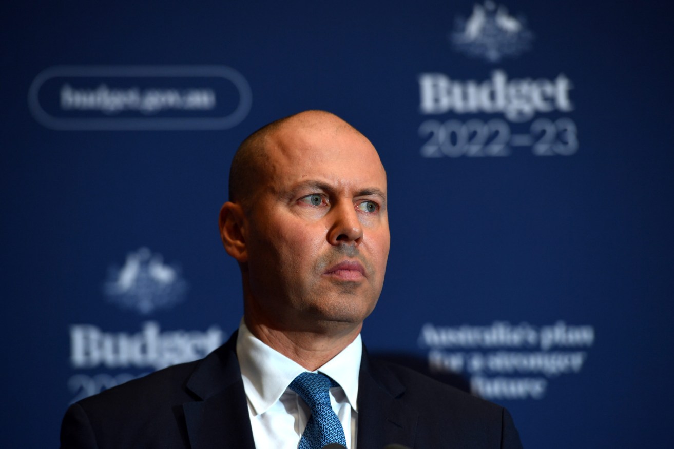 Treasurer Josh Frydenberg speaks to journalists at a press conference before delivering his 2022 Budget speech at Parliament House in Canberra, Tuesday, March 29, 2022. (AAP Image/Mick Tsikas)