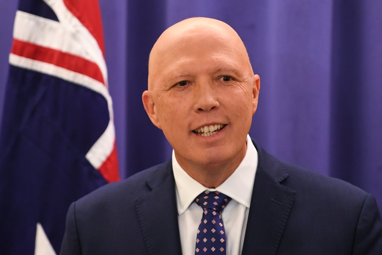 Newly elected Leader of the Liberal Party Peter Dutton speaks to the media after a party room meeting at Parliament House in Canberra. (AAP Image/Lukas Coch) 