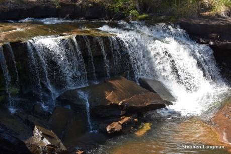 Teenager plunges to her death from North Queensland waterfall