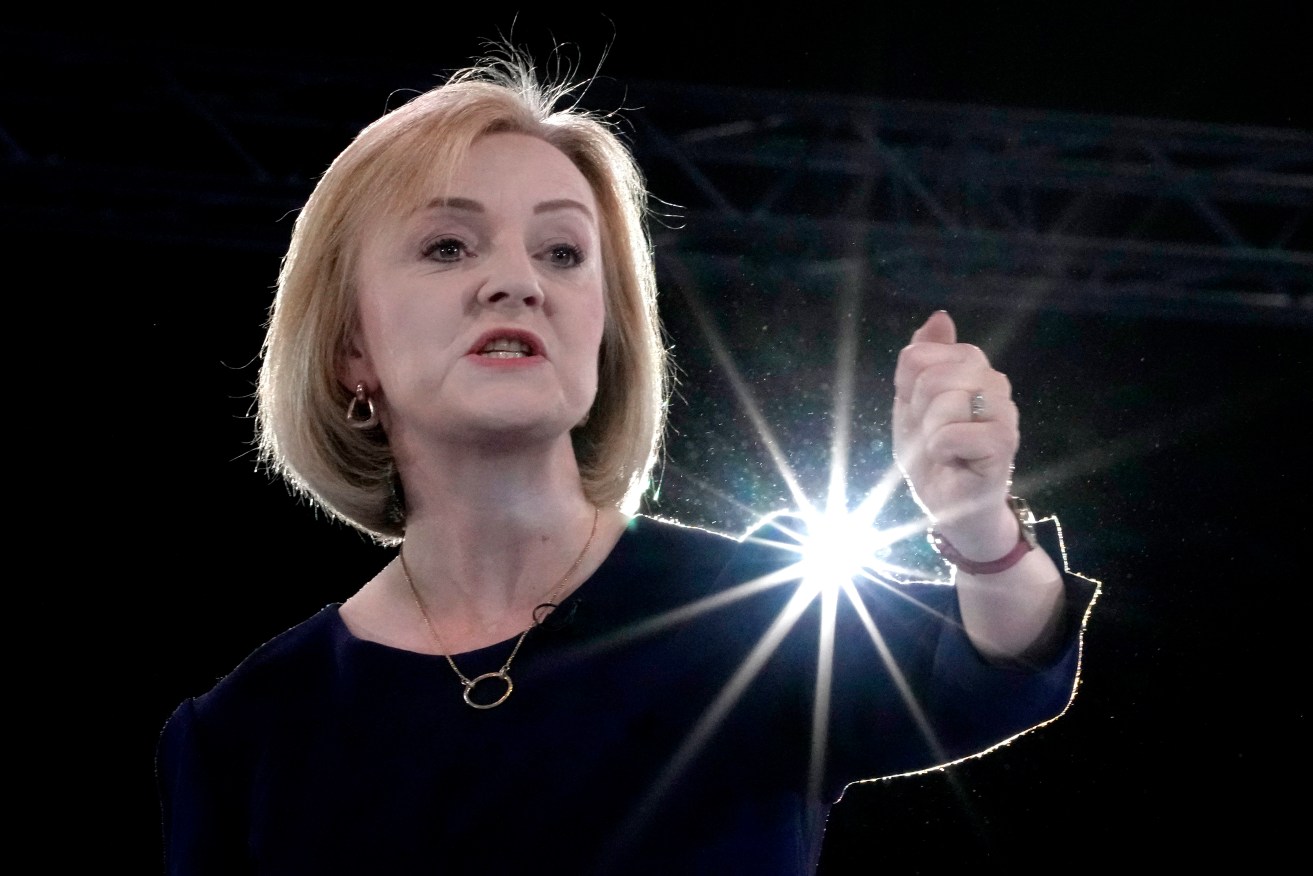 Liz Truss addresses Conservative Party members during a Conservative leadership election hustings at Wembley Arena in London, Wednesday, Aug. 31.  (AP Photo/Kirsty Wigglesworth)