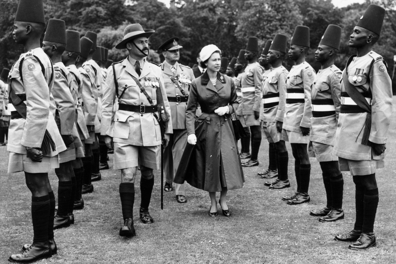 Queen Elizabeth II conducts an inspection of the Kings African Rifles Regiment in the courtyard of Buckingham Palace in London, Britain, 11 June 1957. An infantry regiment from British East Africa that has been in existence since 1902.  EPA/STR   